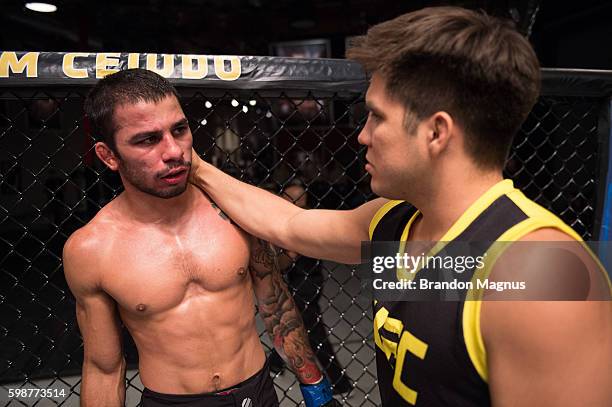 Head coach Henry Cejudo congratulates Alexandre Pantoja on his submission victory over Brandon Moreno during the filming of The Ultimate Fighter:...