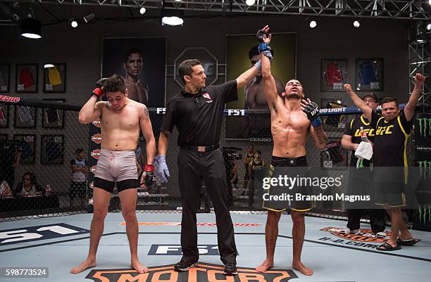 Alexandre Pantoja celebrates his submission victory over Brandon Moreno during the filming of The Ultimate Fighter: Team Benavidez vs Team Cejudo at...