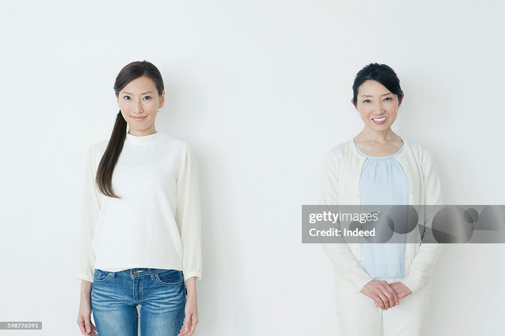 Portrait of young woman and mature woman