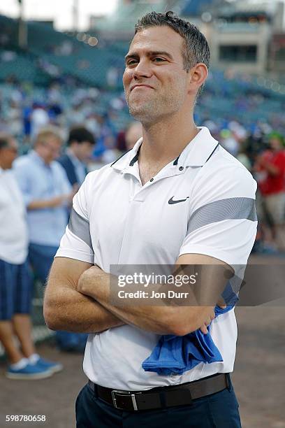 Theo Epstein, President of Operations for the Chicago Cubs, watches batting practice before the game against the Chicago White Sox at Wrigley Field...