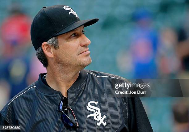 Manager Robin Ventura of the Chicago White Sox looks up in to the stands during batting practice before the game against the Chicago Cubs at Wrigley...