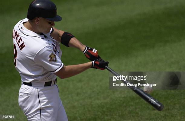 Cal Ripken of the Baltimore Orioles picks up a base hit in his first at bat as designated hitter for the Orioles against the Kansas City Royals at...