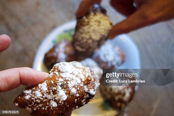 pov christmas & new year - oliebollen stockfoto's en -beelden