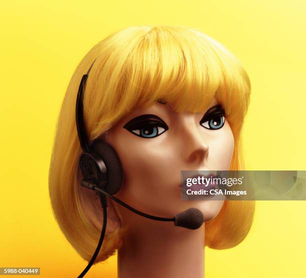 mannequin wearing headset - mannequin blonde stockfoto's en -beelden
