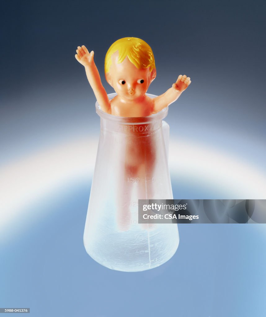 Plastic Baby Doll in Flask