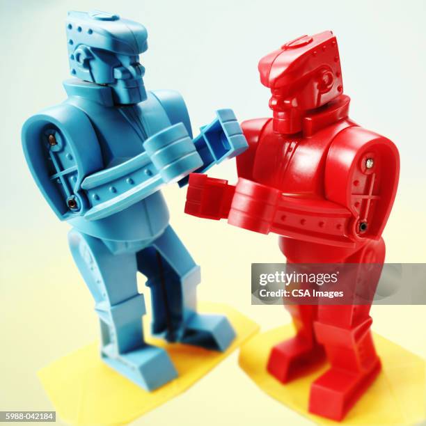 fighting robot toys - fight fotografías e imágenes de stock