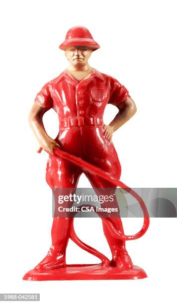 figurine of man holding whip - scarlett lash stock pictures, royalty-free photos & images