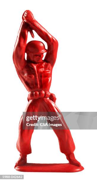 toy soldier holding knife - army soldier toy - fotografias e filmes do acervo