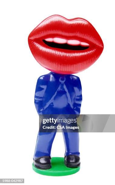 plastic lips with body - big lips stock pictures, royalty-free photos & images