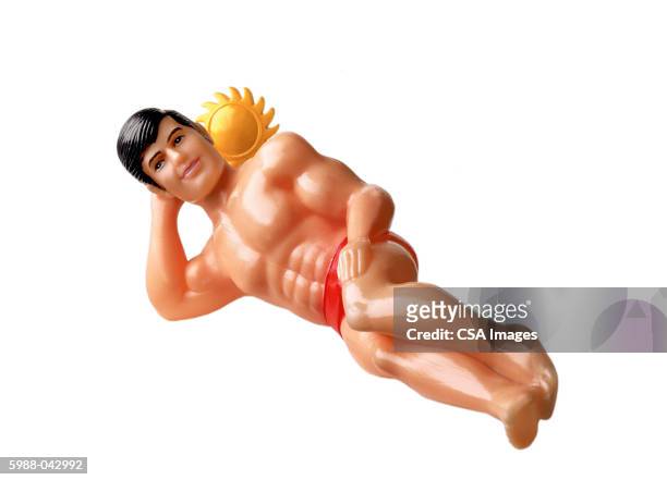 muscular male doll, sun - doll imagens e fotografias de stock