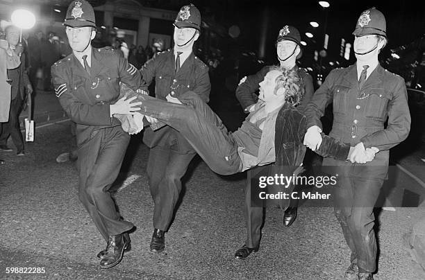 Protestor is arrested during a demonstration against the Vietnam War in London, UK, 21st October 1967.