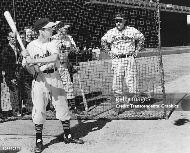Baseball player Lou Boudreau, of the Cleveland Indians, oversees a baseball camp for boys at Municipal Stadium, Cleveland, Ohio, 1950.