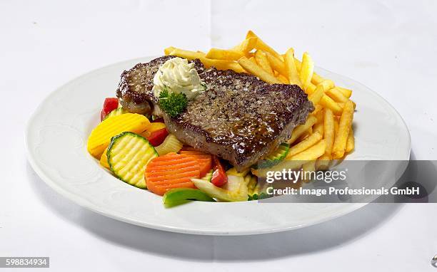 rump steak with chips and summer vegetables - rump steak and chips stock pictures, royalty-free photos & images