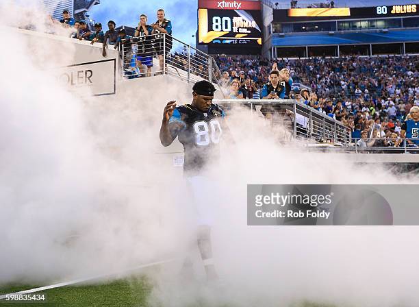 Julius Thomas of the Jacksonville Jaguars dances onto the field before the preseason game against the Cincinnati Bengals at EverBank Field on August...