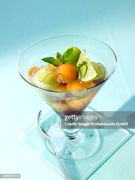 melon salad with cassis - cassis fruit stock pictures, royalty-free photos & images