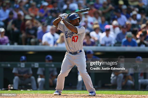 Howie Kendrick of the Los Angeles Dodgers bats against the Colorado Rockies at Coors Field on August 31, 2016 in Denver, Colorado.