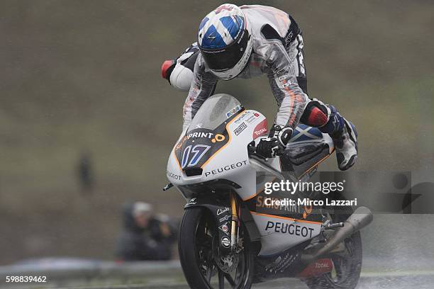 John McPhee of Great Britain and Peugeot Saxoprint MC makes an high-side during the Moto3 race during the MotoGp of Czech Republic - Race at Brno...