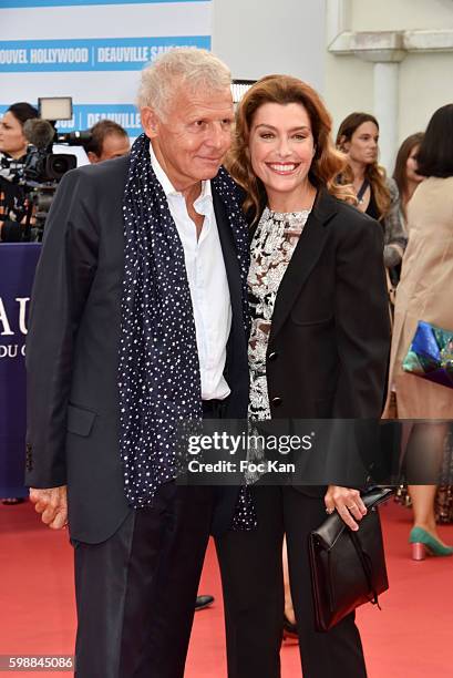 Patrick Poivre d'Arvor and Daphne Roulier attend the 'Infiltrator' Deauville Premiere as part of 42nd Deauville American Film Festival Opening...