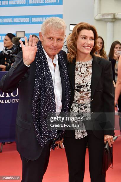 Patrick Poivre d'Arvor and Daphne Roulier attend the 'Infiltrator' Deauville Premiere as part of 42nd Deauville American Film Festival Opening...