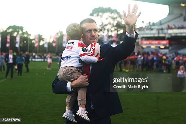 Ben Creagh of the Dragons waves to the crowd after the round 26 NRL match between the St George Illawarra Dragons and the Newcastle Knights at WIN...