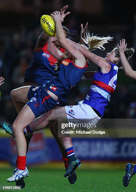 Tayla Harris of the Demons marks the ball during the AFL Women's Exhibition Match between the Western Bulldogs and the Melbourne Demons at Whitten...