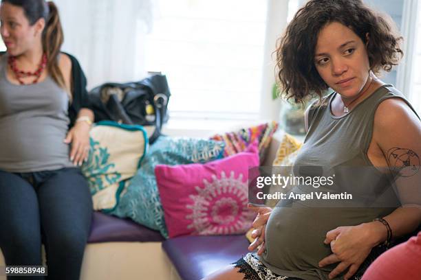 Coraliz Dones, 34 and 9 months pregnant, who tested positive for Zika when she was 7 months pregnant, interacts with other pregnant women at the...