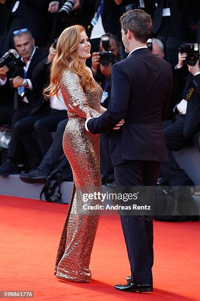 Amy Adams and Darren Le Gallo attends the premiere of 'Nocturnal Animals' during the 73rd Venice Film Festival at Sala Grande on September 2, 2016 in...