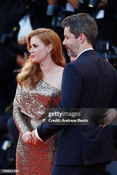 Amy Adams and Darren Le Gallo attends the premiere of 'Nocturnal Animals' during the 73rd Venice Film Festival at Sala Grande on September 2, 2016 in...