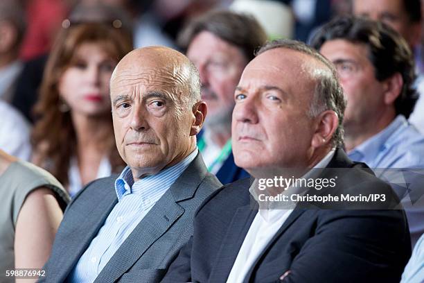 President of the French employers federation Medef, Pierre Gattaz and Mayor of Bordeaux and candidate for the Primary Election of the Right wing Les...