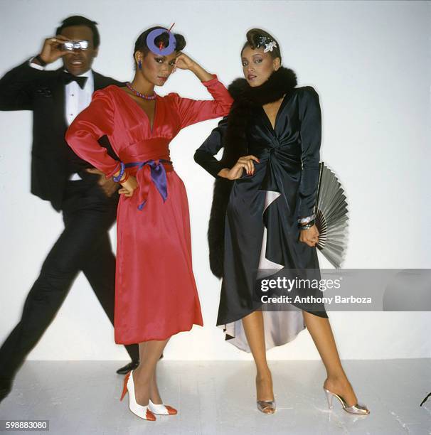 Portrait of models Sheila Johnson and Gay Thomas as they pose against a white background during a studio session, New York, New York, 1980s. Male...