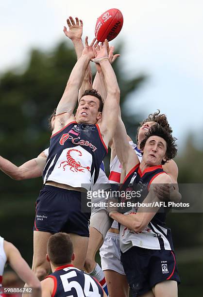 Liam Hulett and Oscar Mcinerney of Casey Scorpions compete for the ball during the VFL Qualifying Final match between Casey and Footscray at Casey...
