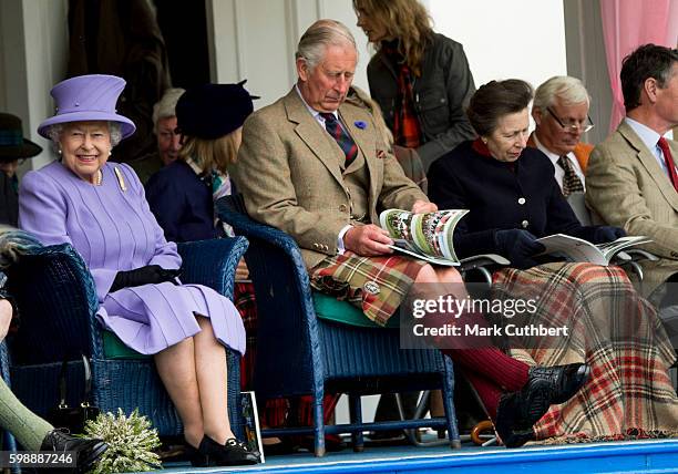 Queen Elizabeth II with Prince Charles, Prince of Wales and Princess Anne, Princess Royal attend The 2016 Braemar Highland Gathering on September 3,...