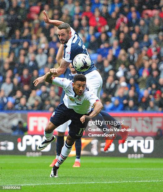Bolton Wanderers' Keshi Anderson vies for possession with Southend United's John White during the Sky Bet League One match between Bolton Wanderers...