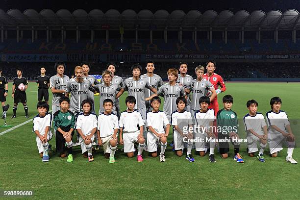 Players of Blaublitz Akita pose for photograph prior to the 96th Emperor's Cup first round match between Kawasaki Frontale and Blaublitz Akita at...