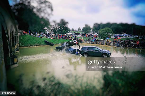 Nicholas Lucy of Great Britan riding Proud Courage jumps over Lion Bridge during the Cross Country during The Land Rover Burghley Horse Trials 2016...