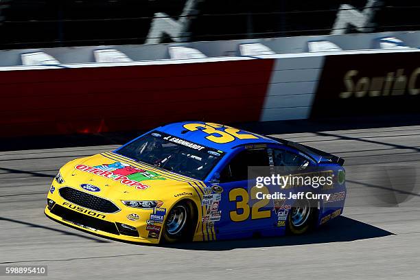 Jeffrey Earnhardt, driver of the Otter Pops/Corvetteparts.net Ford, practices for the NASCAR Sprint Cup Series Bojangles' Southern 500 at Darlington...