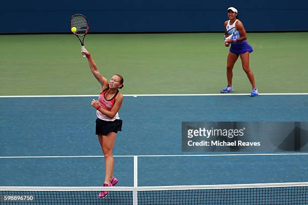 Michaella Krajicek of Netherlands and Heather Watson of the United Kingdom in action against Nao Hibino of Japan and Nicole Gibbs of the United...