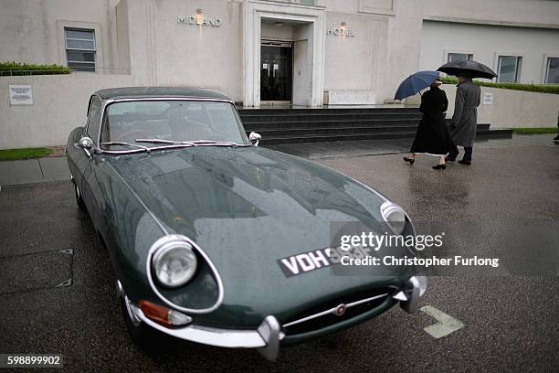 MORECAMBE, ENGLAND A classic E-type Jaguar stands outside The Midland Hotel as enthusiasts in vintage attire arrive for the Vintage By The Sea...