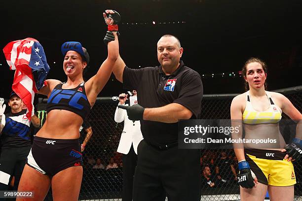 Ashlee Evans-Smith of the USA celebrates his knockout victory over Veronica Macedo of Venezuela in their Womens Bantamweight Bout during the UFC...