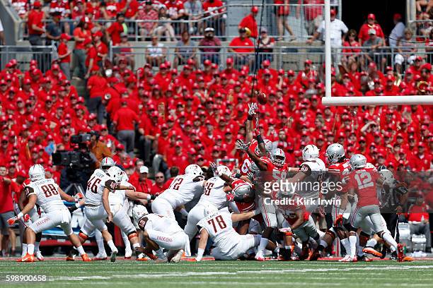 Jake Suder of the Bowling Green Falcons kicks an extra point during the first quarter of the game against the Ohio State Buckeyes on September 3,...