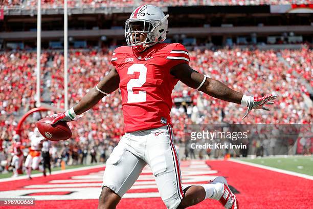 Dontre Wilson of the Ohio State Buckeyes celebrates after scoring a touchdown during the first quarter of the game against the Bowling Green Falcons...