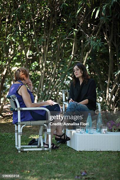 Actress Sophie Semin talks to the press at a press junket for 'Les Beaux Jours D'Aranjuez' during the 73rd Venice Film Festival at on September 01,...