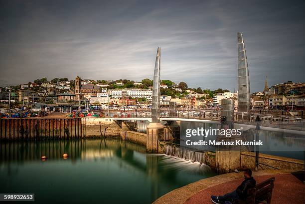 torquay old town harbour bridge long exposure - torquay stock pictures, royalty-free photos & images