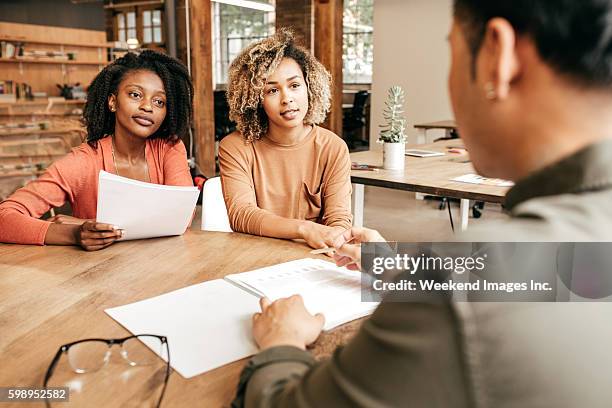 business meeting - african american interview stock pictures, royalty-free photos & images