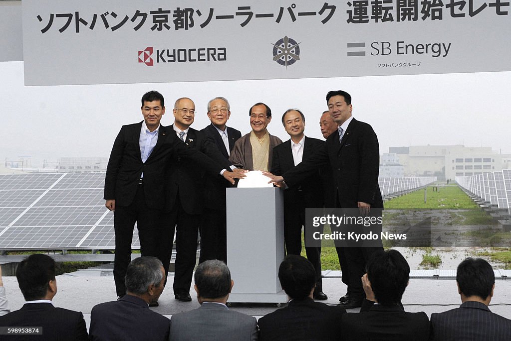 Softbank celebrates start of solar power plants