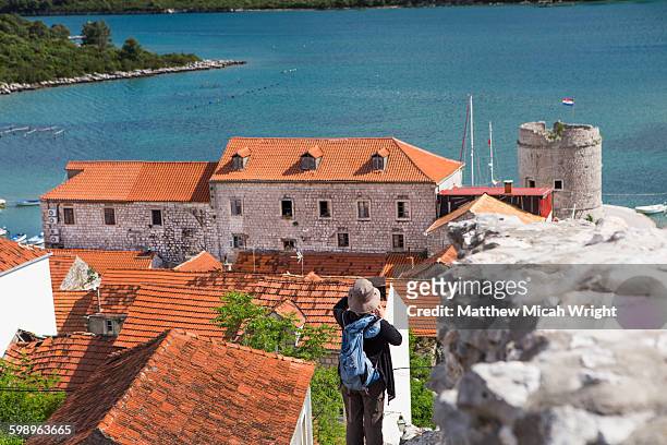 castle walls surround this croatian city. - croatia tourist stock pictures, royalty-free photos & images