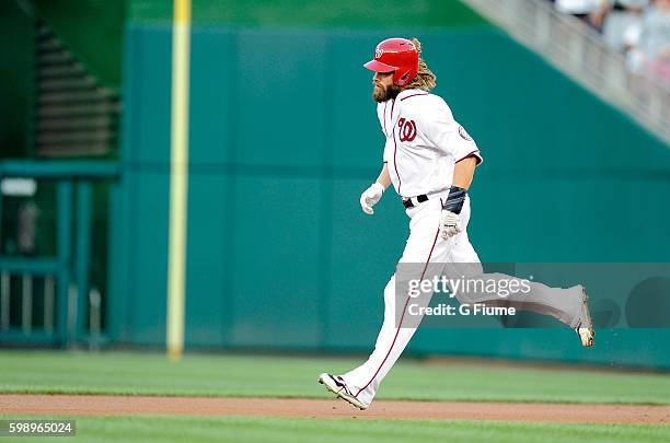 Jayson Werth of the Washington Nationals rounds the bases after hitting a home run against the Colorado Rockies at Nationals Park on August 26, 2016...