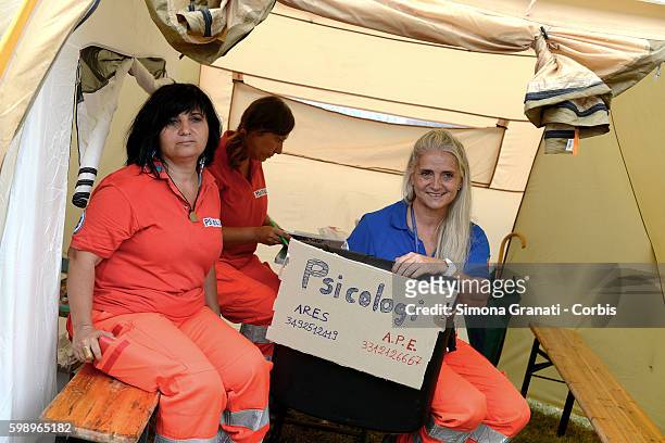 Team of psychologists including Dorotea Ricci sit in the tent camp for earthquake victims on August 31, 2016 in Arquata del Tronto, Italy. The region...
