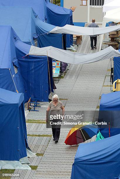 Woman walks through the tent camp for earthquake victims ion August 31, 2016 in Arquata del Tronto, Italy. The region was struck by a powerful,...