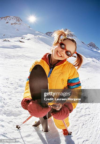 girl with skis in winter landscape, tignes, france - ski wear stock pictures, royalty-free photos & images